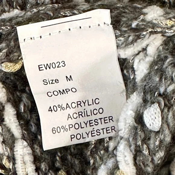 GEEGEE woman’s v-neck, knit sweater.
Size: Medium
back - Picture 6 of 8